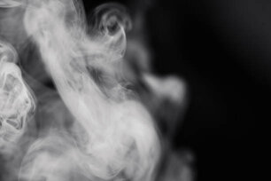A close-up shot of smoke on a black background.