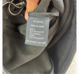 The black Lyft Jacket tag