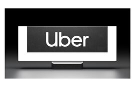 A black and white Uber beacon