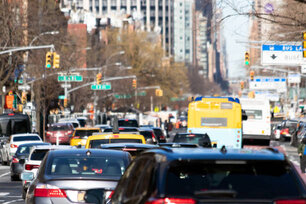 Cars, taxis and buses are crowded along 1st Avenue during rush hour traffic in Manhattan New York City NYC