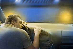 Driver sleeping in the car just before a frontal crash with a lorry.