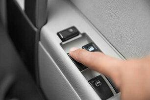 A portrait of windows controls and adjustments. Car window controls